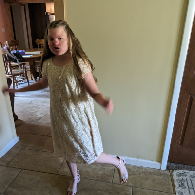 girl with long blonde hair dances