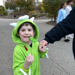 Young boy with CHARGE syndrome in a halloween costume. 