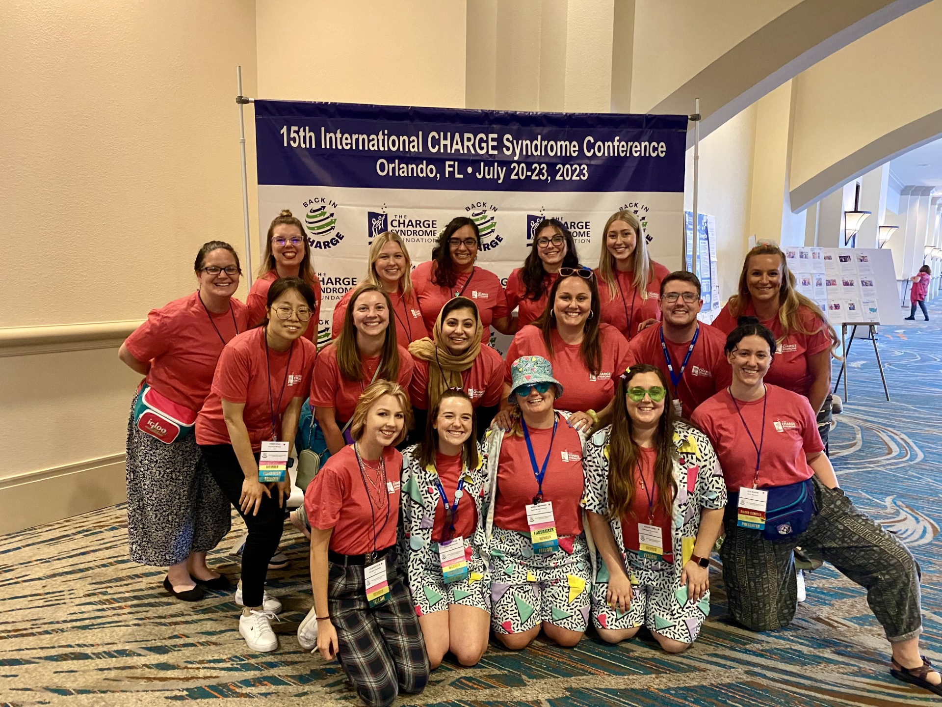 The 2023 Davenport Fellows and Mentors dressed up in red shirts and 90’s apparel for the 90’s dance party. 